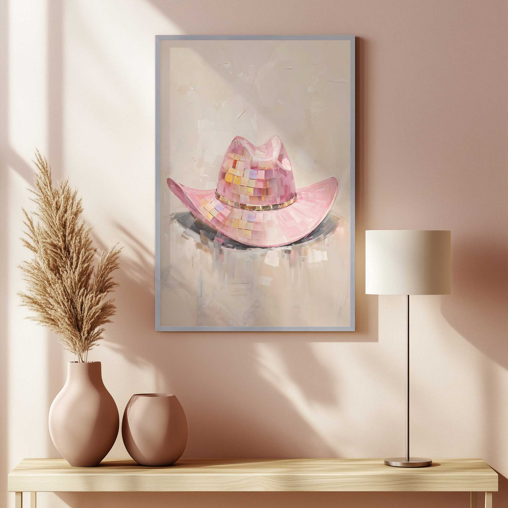 framed pink cowboy hat hanging above console table