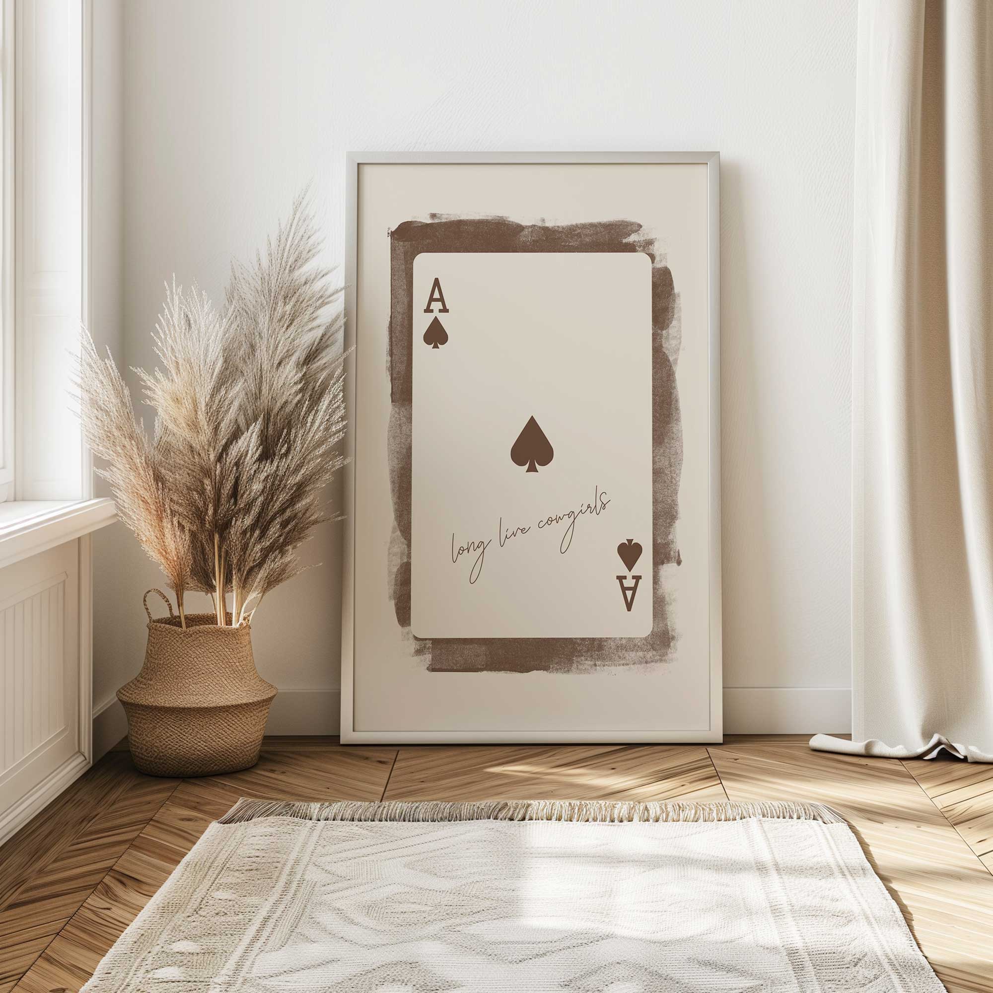 Ace of Cowgirls Art Print leaning against the wall