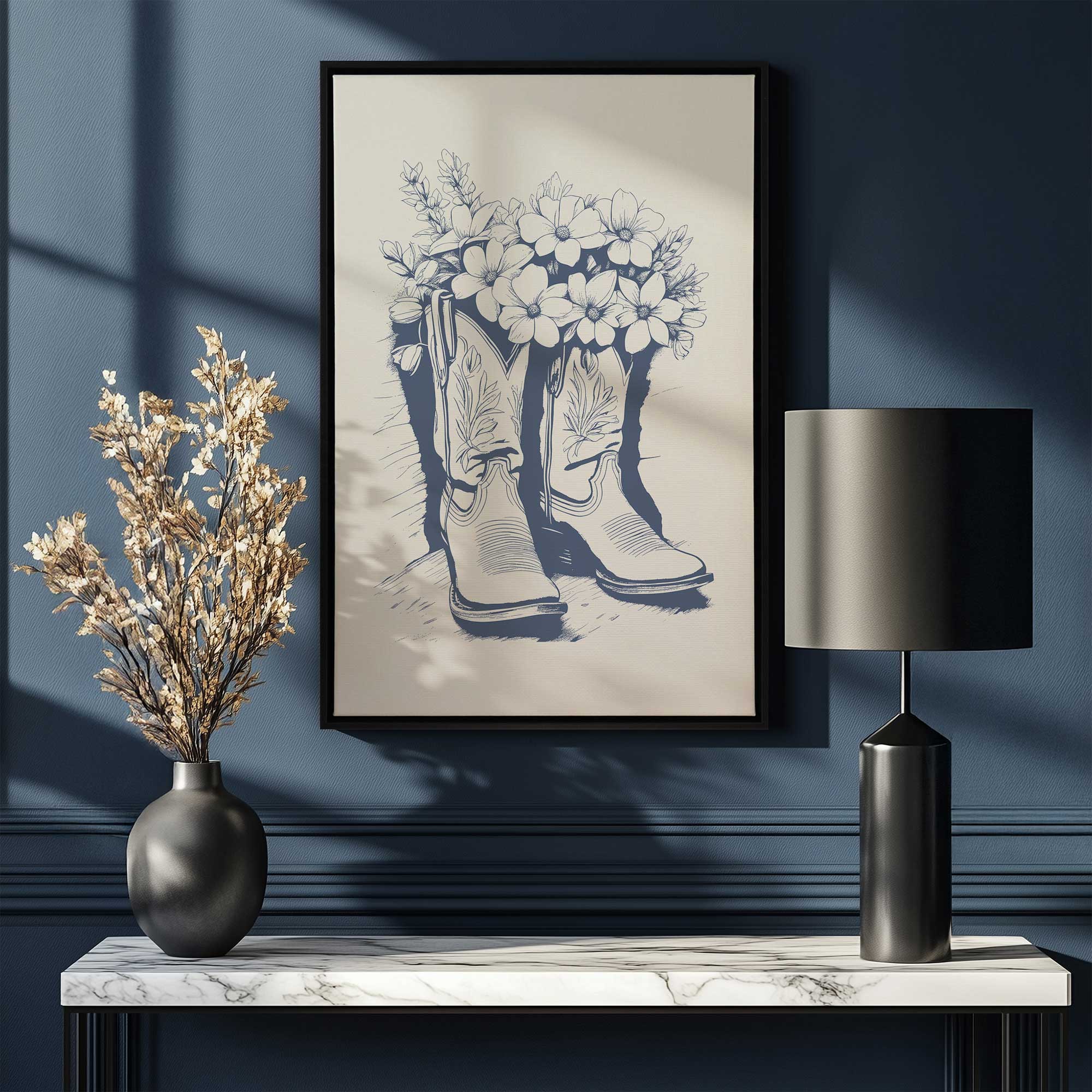 western boots wild roots in blue canvas print in a black floater frame hanging above a console table