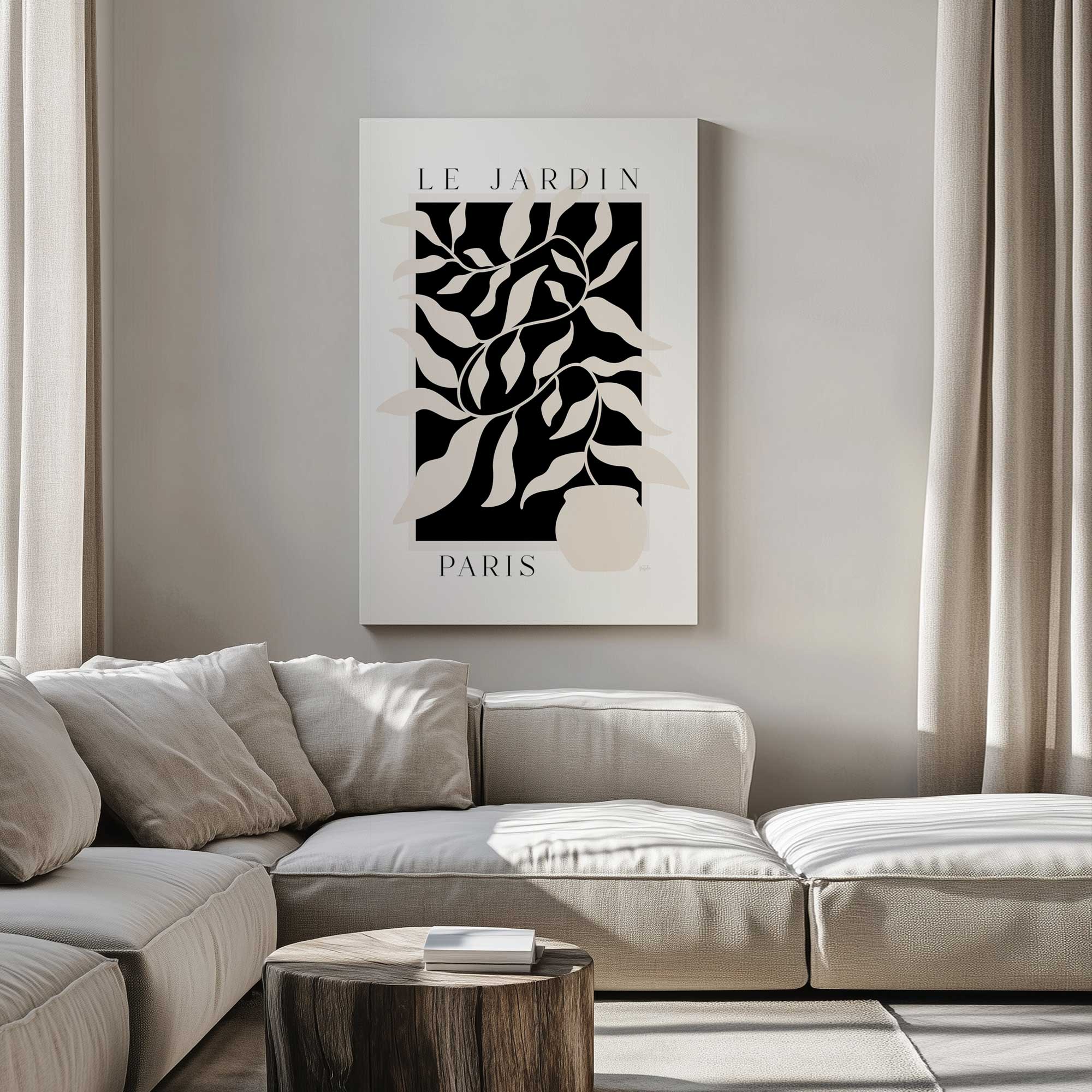 Paris Plant Drama Canvas Print hanging above a gray couch