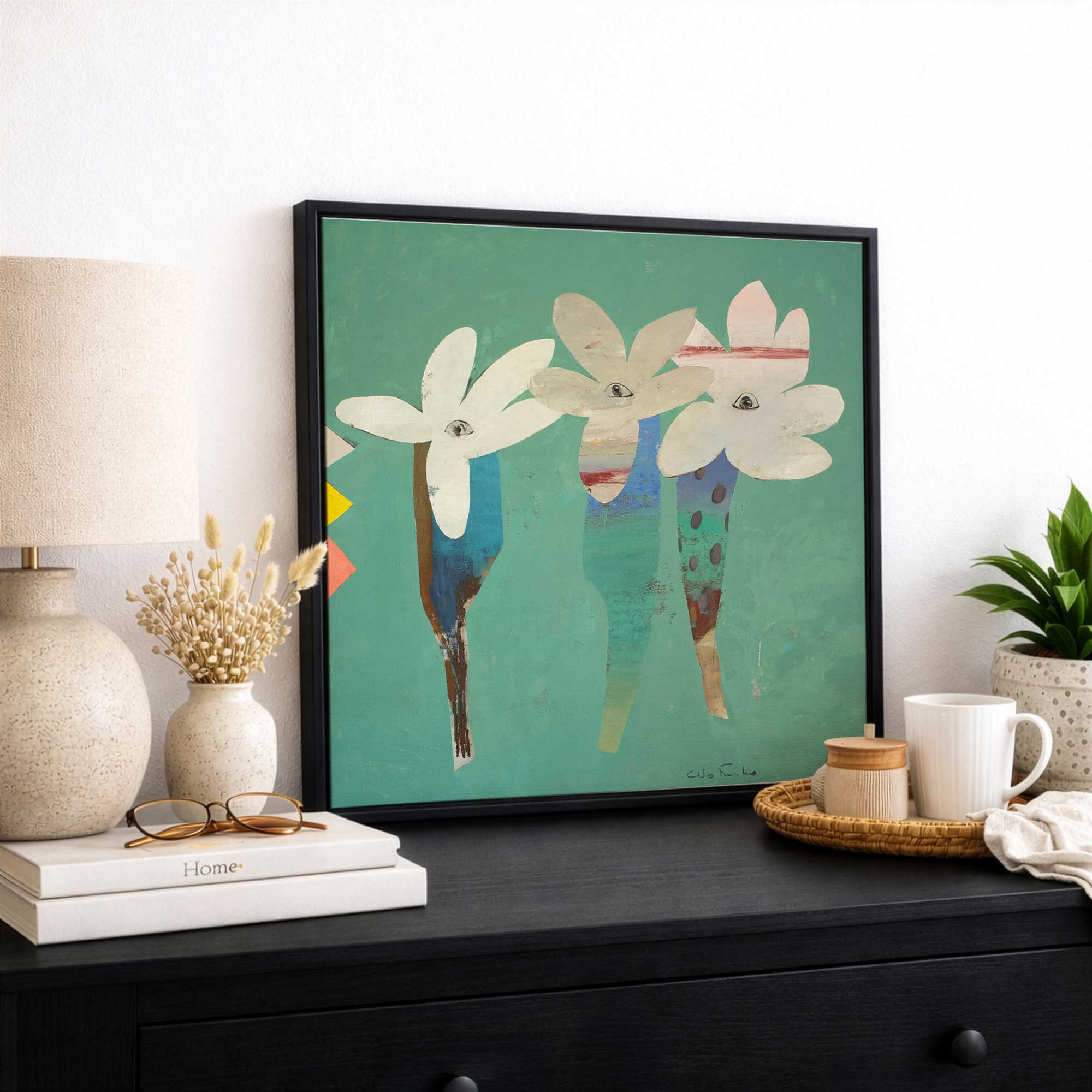 Side eye flowers canvas print in a black floater frame