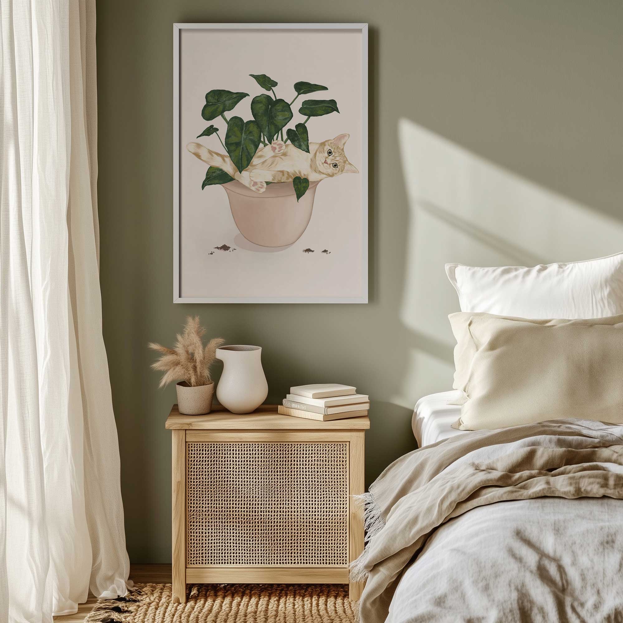 pot it likes its hot neutral cat in a plant art print hanging above a bed side table