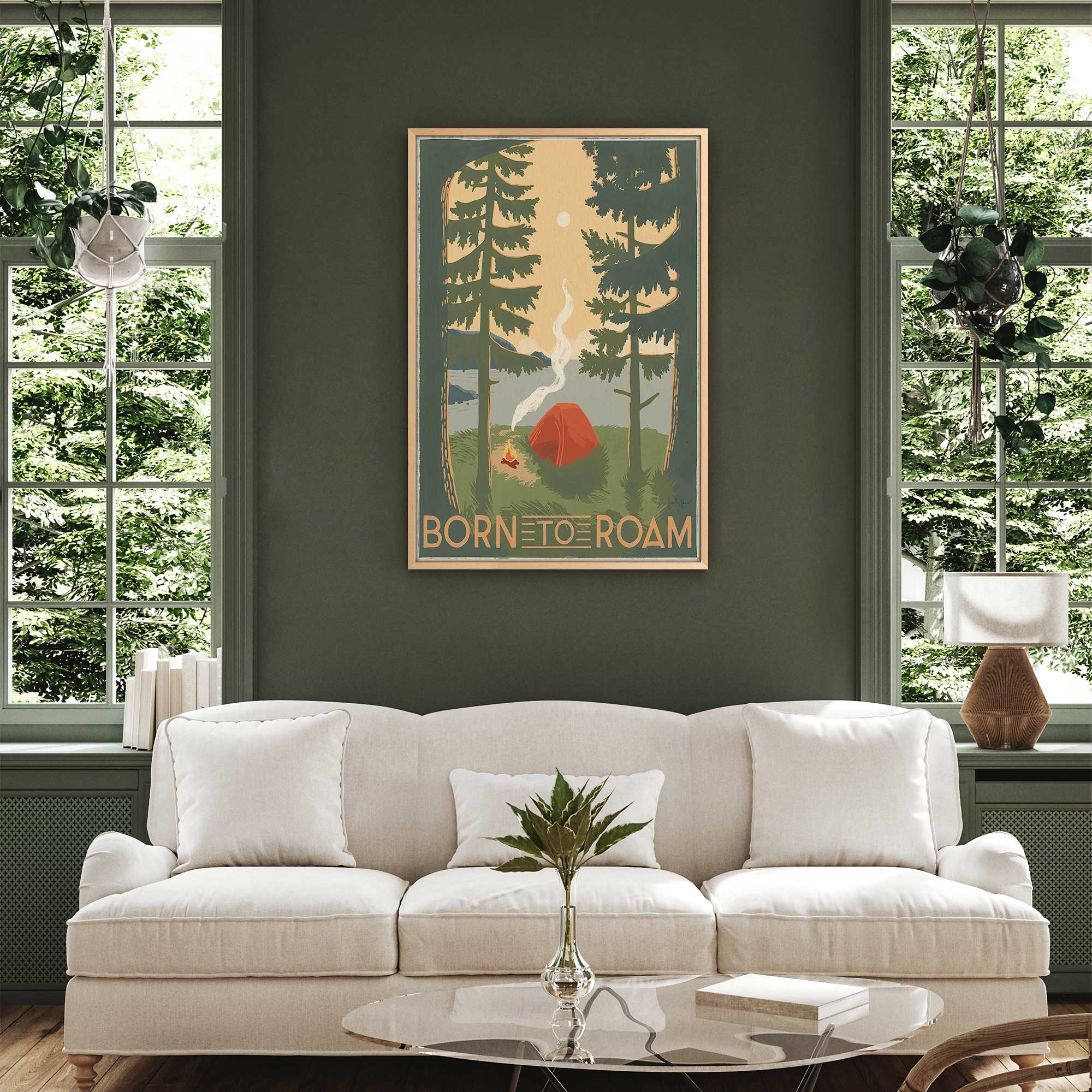 born to roam camping art print hanging above a white couch