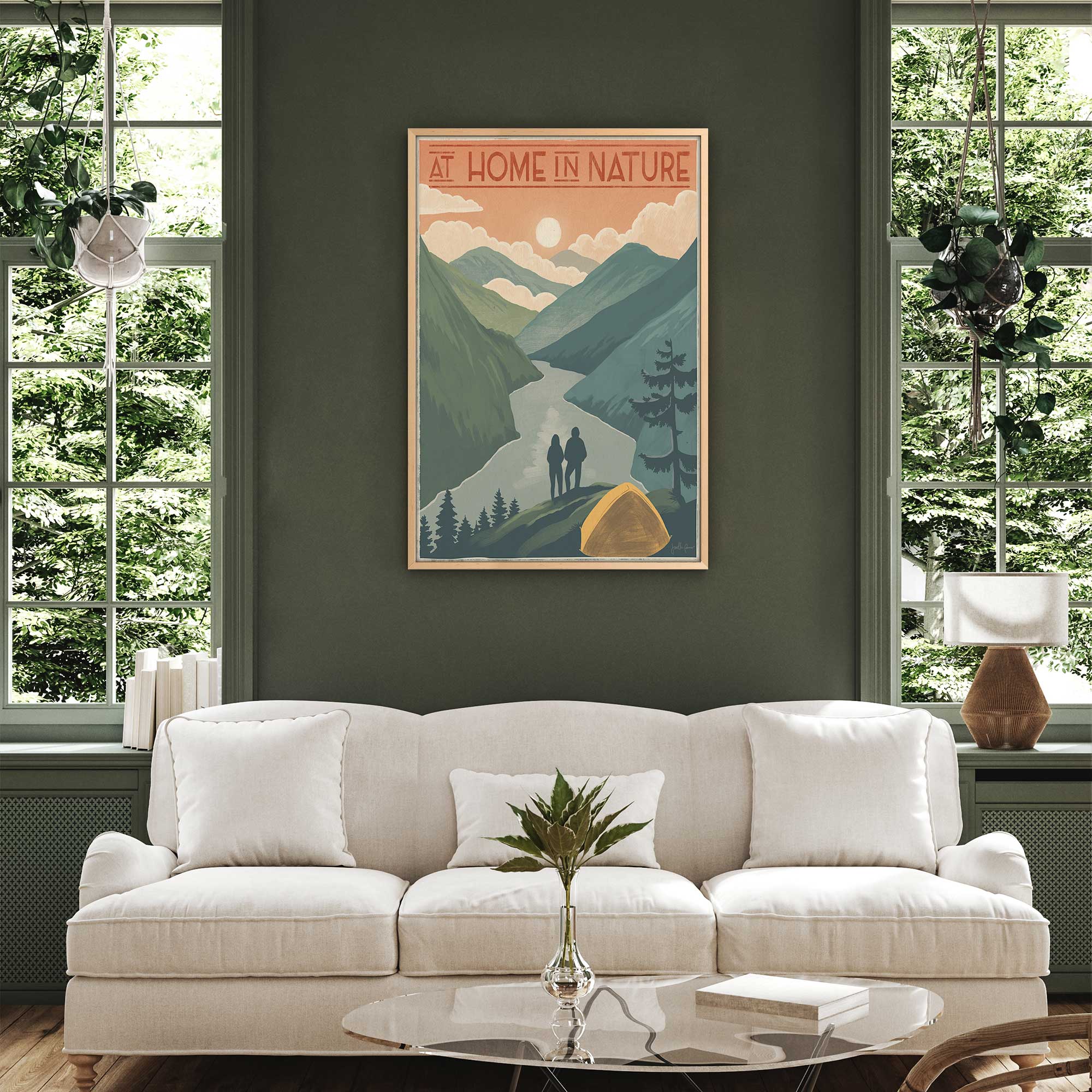 at home in nature painting art print hanging above a couch in a green living room