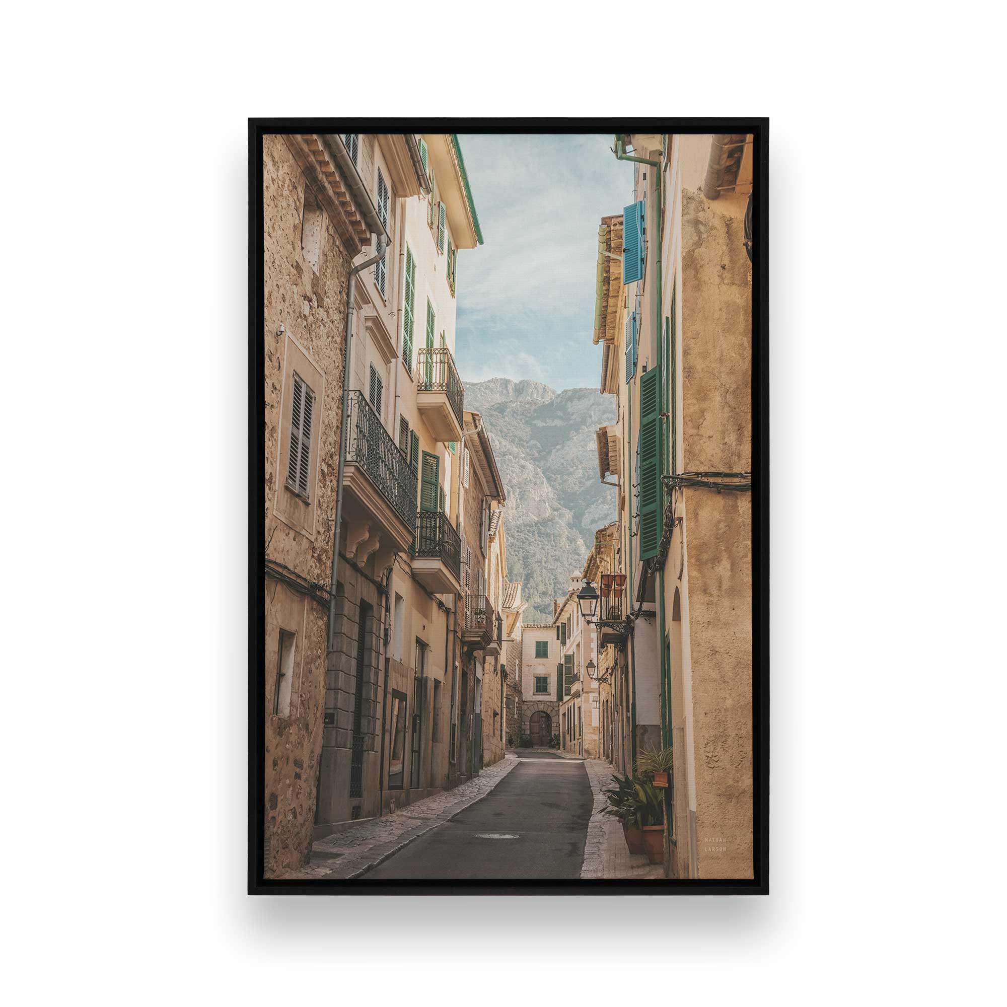 Quiet Streets of Spain canvas art print in a black floater frame