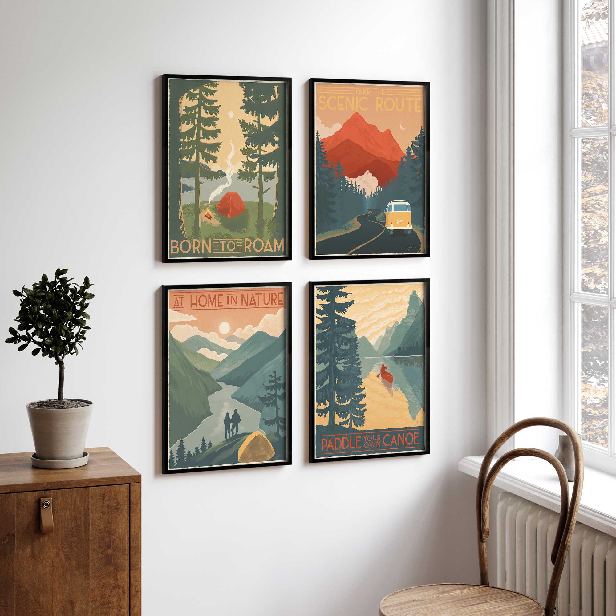 explore the outdoors art print set of 4 framed prints hanging by the window