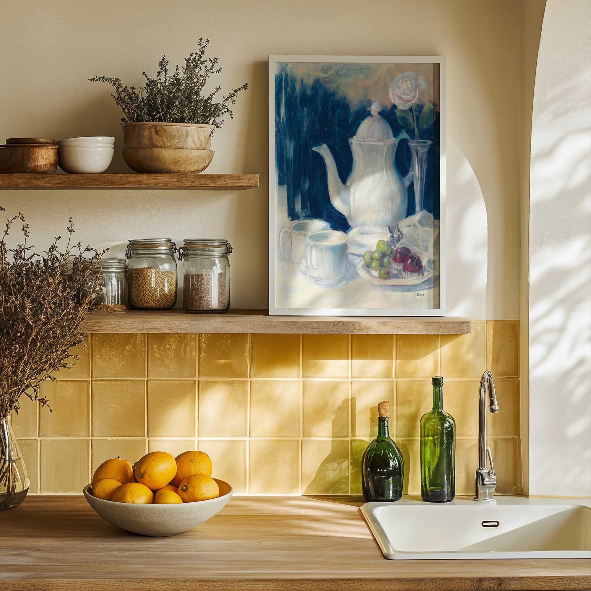 Tea Time Bliss art print in a white frame on a shelf in a mediterranean style kitchen