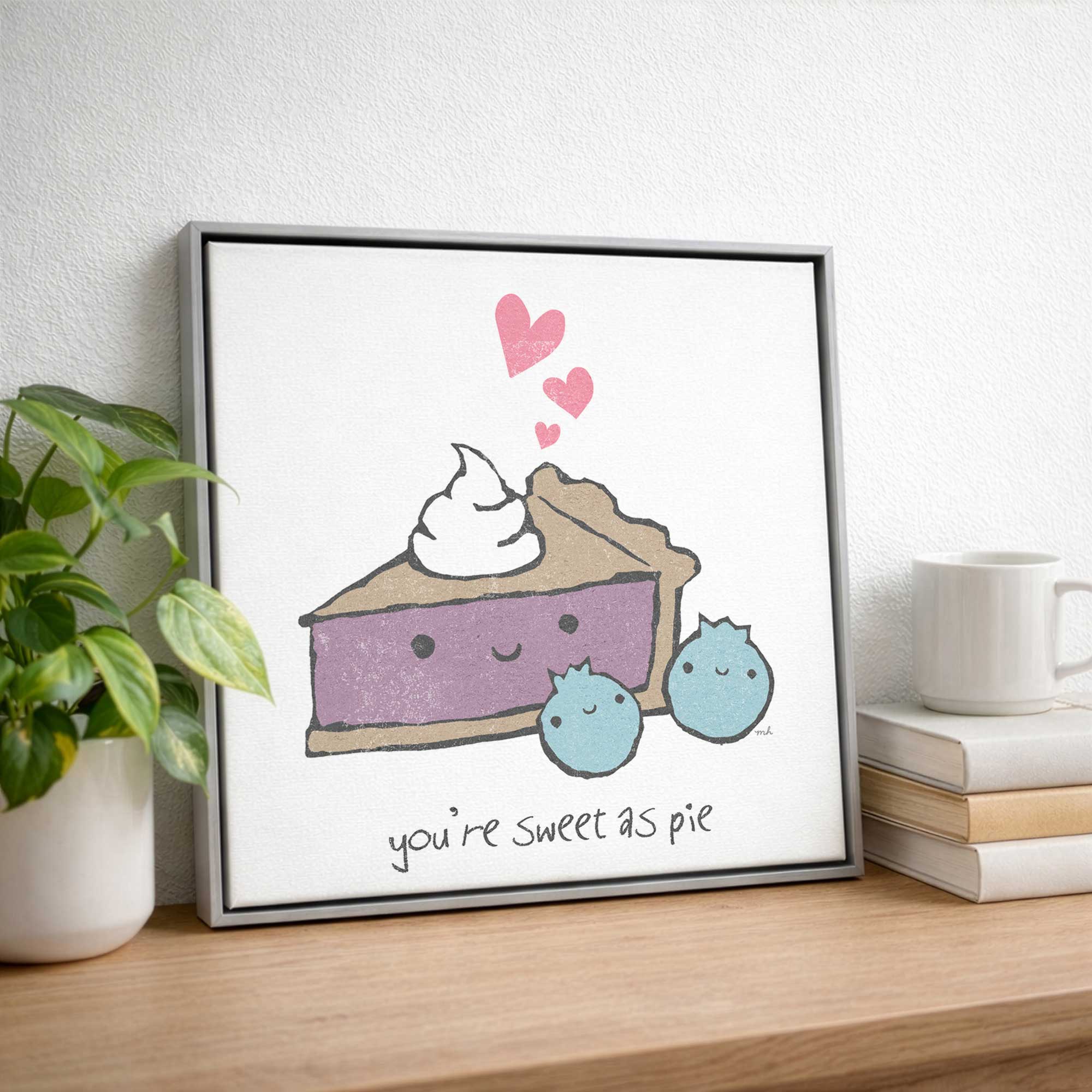 Pie Love Party canvas print in a silver floater frame on a console table