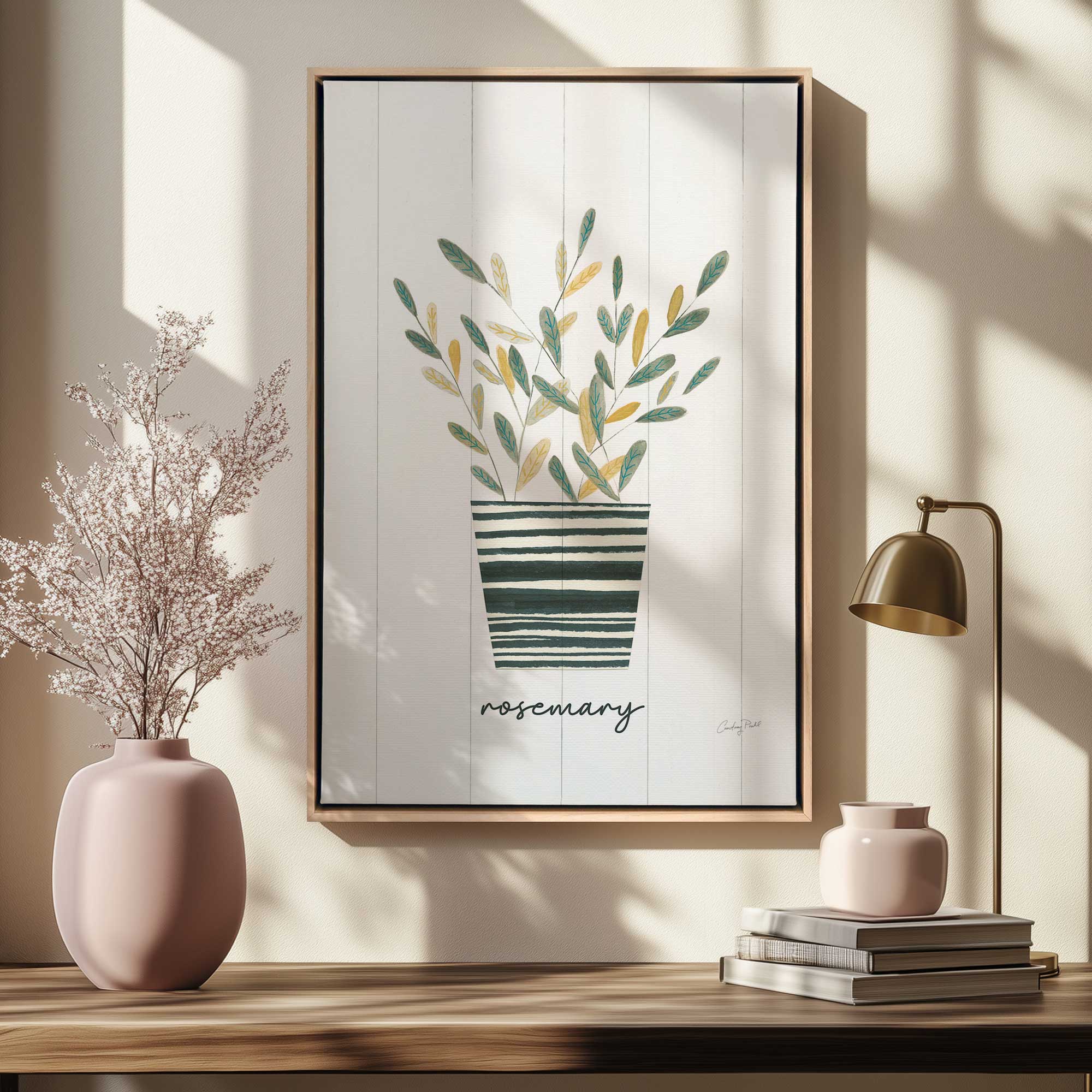 Herb garden chic rosemary canvas print in a white maple floater frame hanging above a desk