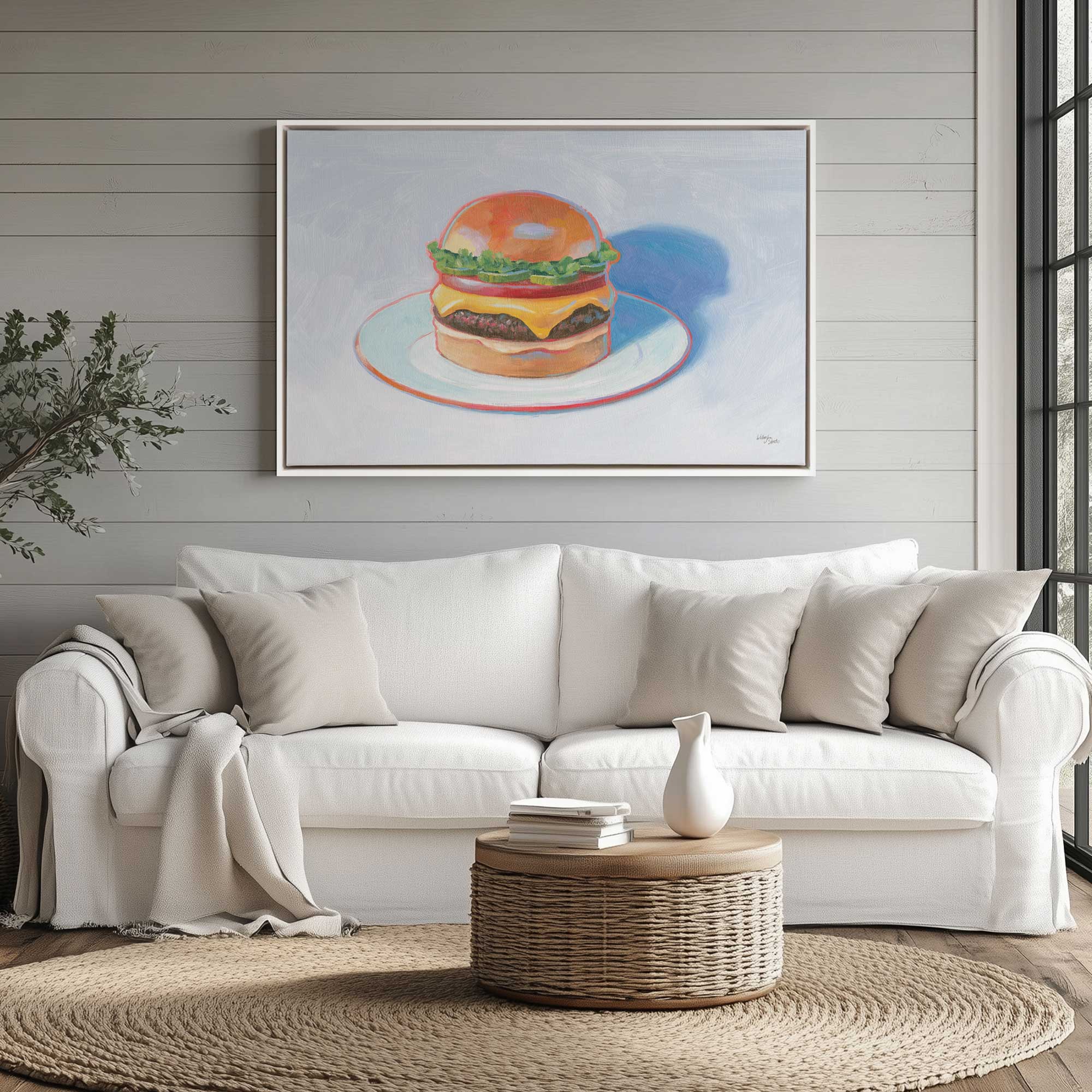 Classic Cheeseburger with a pop canvas art print hanging above a couch