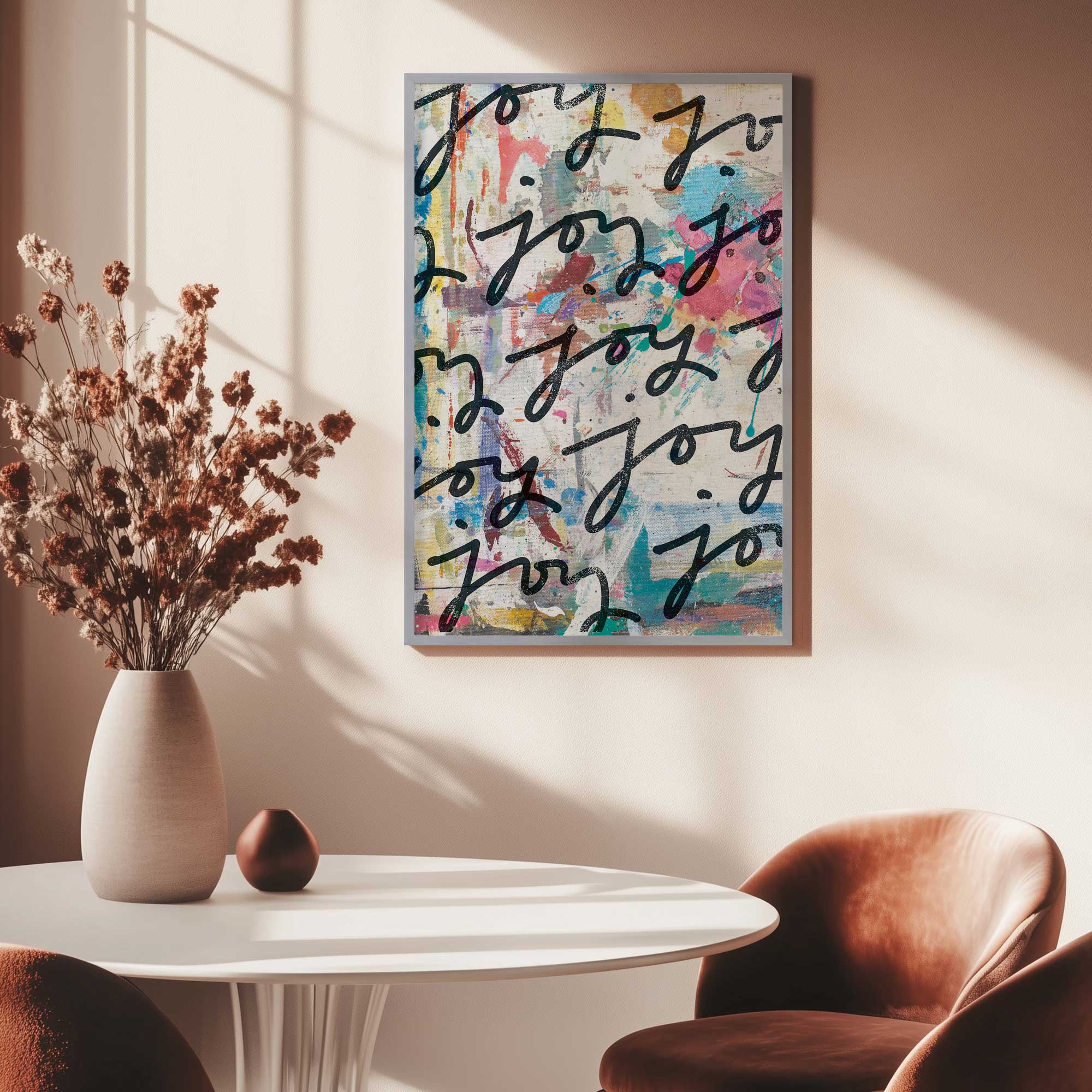 layers of joy art print hanging above a kitchen table